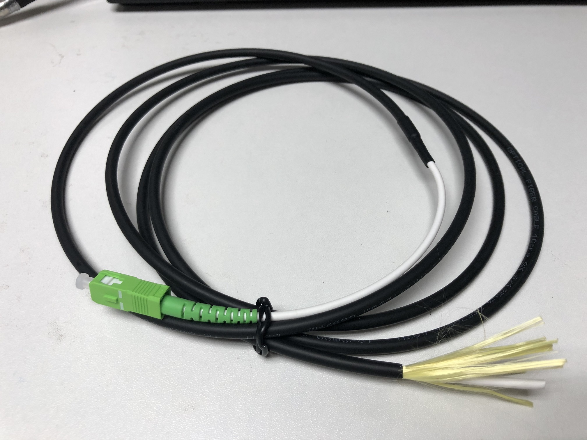 Indoor/Outdoor SC/APC Fiber Optic Pigtail 4.8mm Ruggedized Double Jacket G657A1 3 Meters