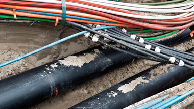 What are the benefits of air blowing fibre cables?